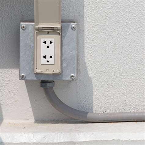 electrical junction box elevation garage|garage outlet height code.